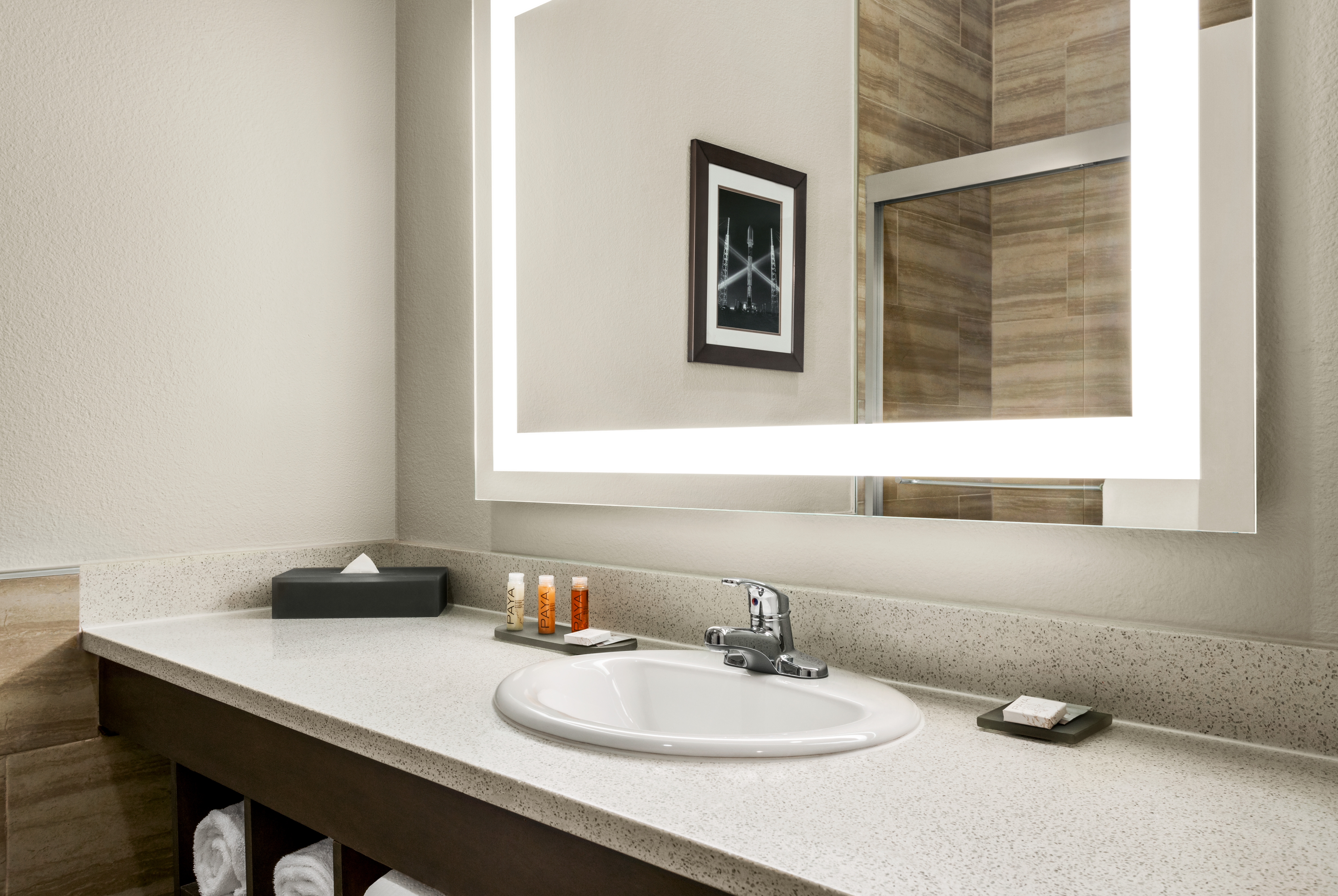 Guest room bath at the La Quinta Inn & Suites by Wyndham Brownsville North in Brownsville, Texas